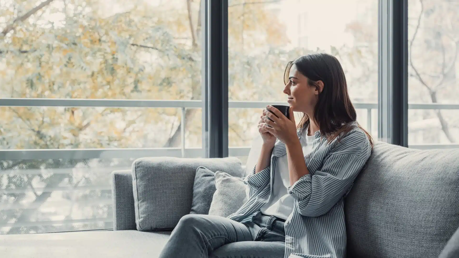 Woman sipping coffee